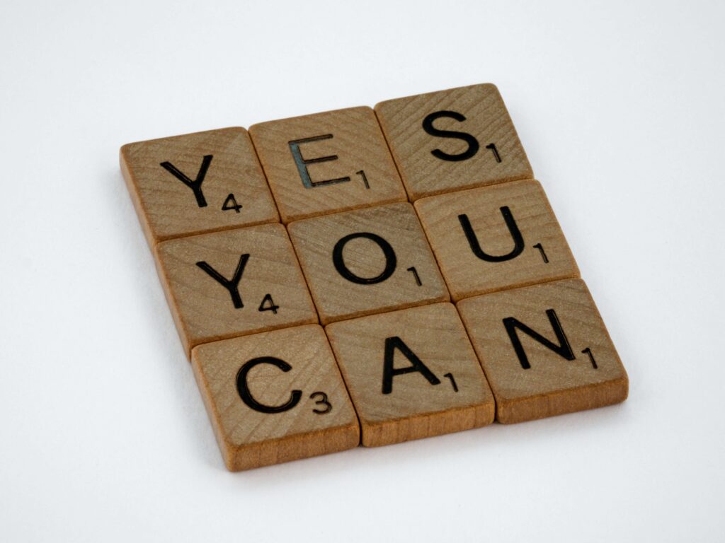 Scrabble tiles forming Yes You Can