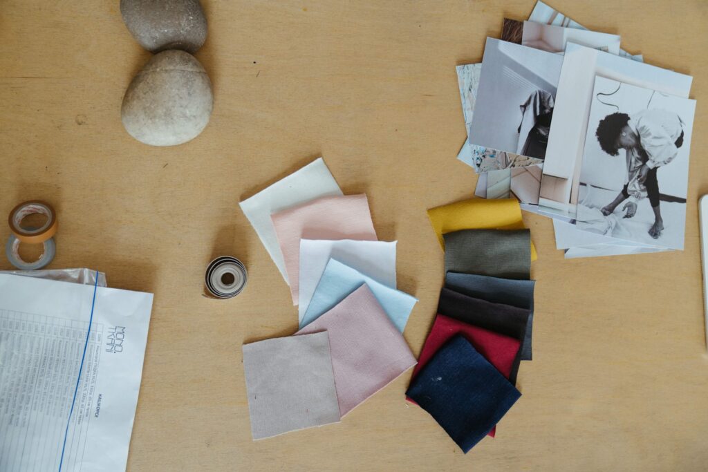 Top Shot: Cloth swatches and pictures on table