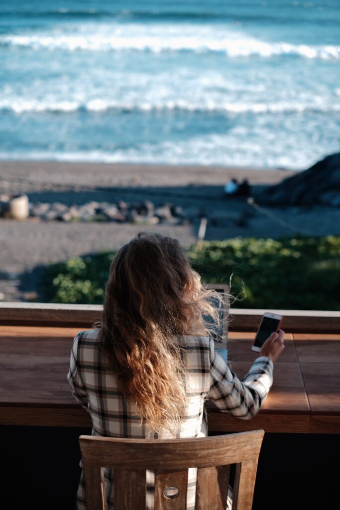 woman working at the beach