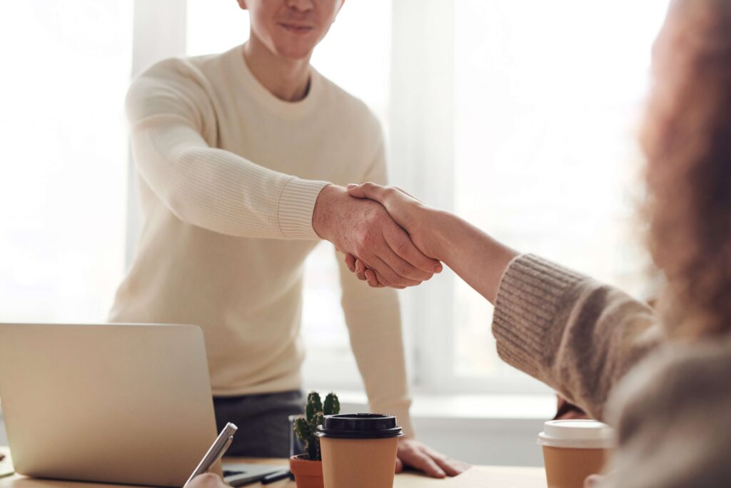 shake hands with client