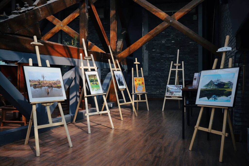 Artworks on easels on display