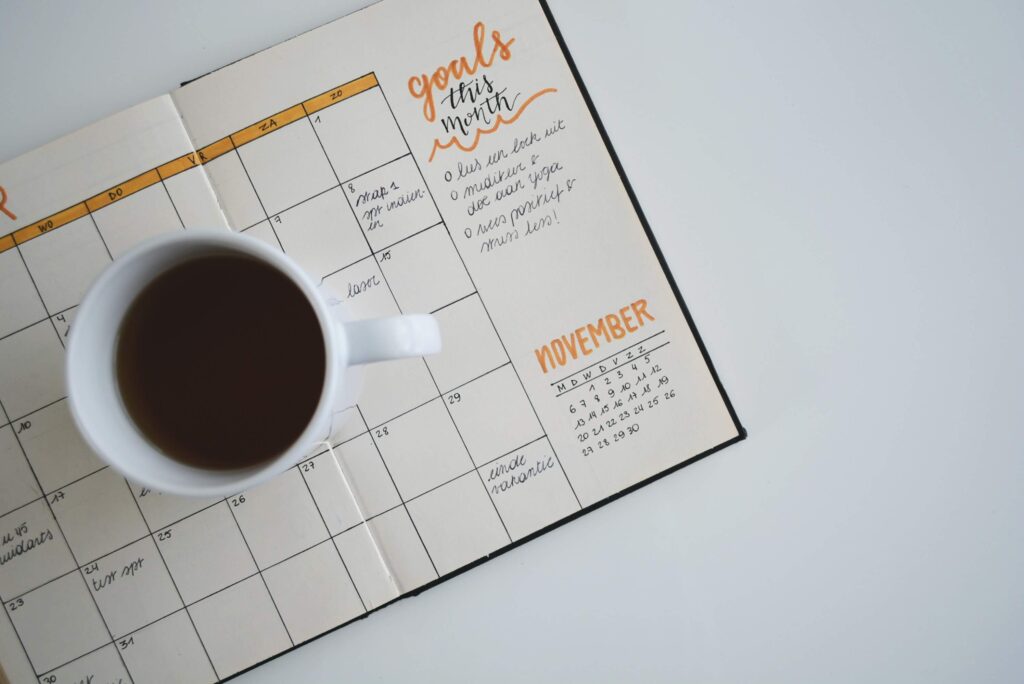 goals planner with coffee