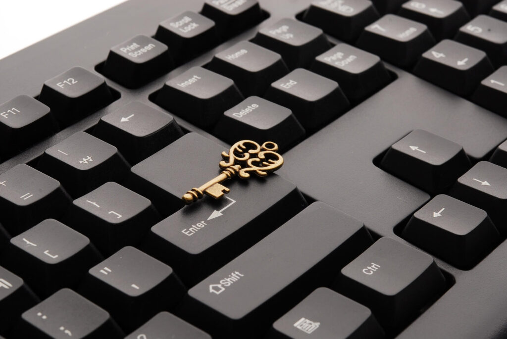 close up of a keyboard with a key on top