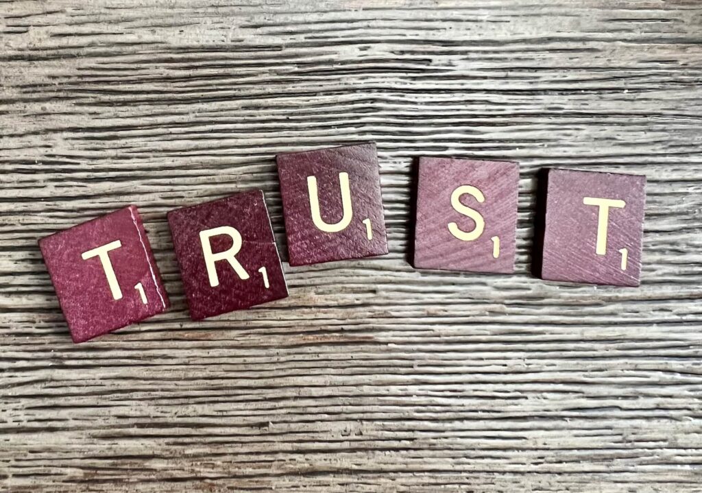 TRUST formed from scrabble blocks