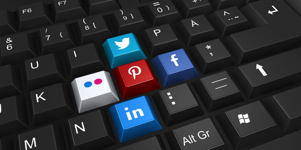 social media icons on black keyboard