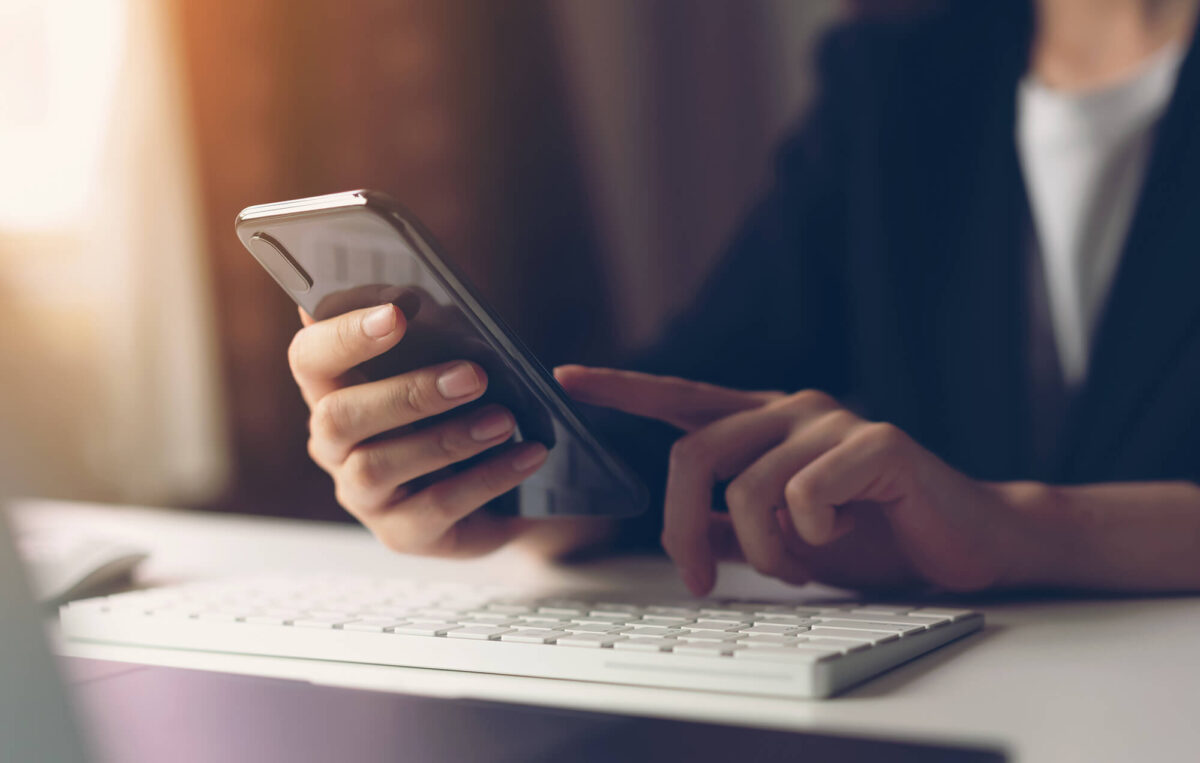 woman looking at cellphone