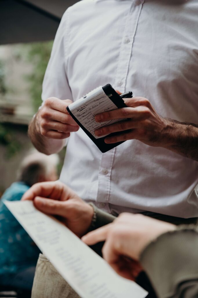 customer checking billing with server waiting 
