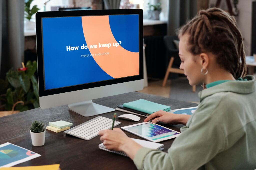 woman working in front of a computer